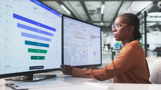 Marketing Manager Analyzes Sales Funnel Data On Computer
