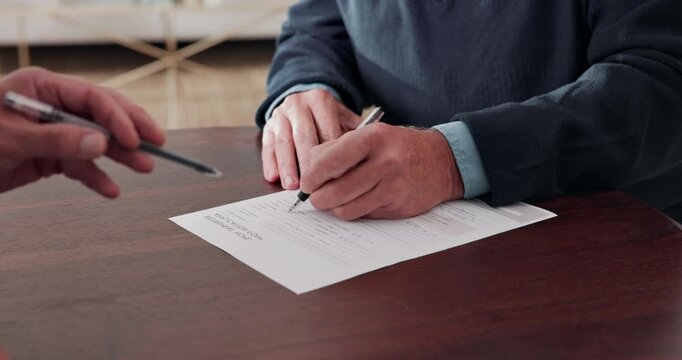 Agent, writing and hands of old man with form for health coverage, medicare policy or information. Retirement, insurance broker and senior client with application for medical history, survey or home