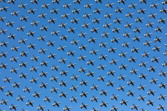 Military ground attack jets in a repeating pattern