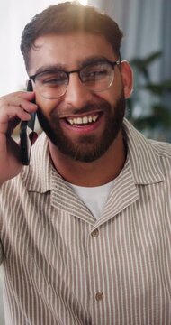 Ecommerce, man and phone call in office with fist pump, supply chain goals or sales achievement. Happy, person talk or contact in small business with tech, logistics success or celebration for profit