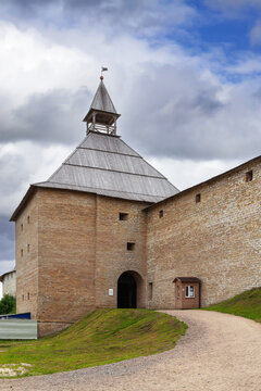 Gate tower of Staraya Ladoga fortress in Russia. Eye level view of the stone entrance under a summer sky
