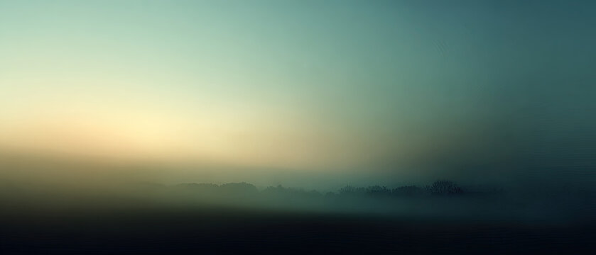 Serene sunrise over a misty landscape with soft gradients of blue and gold, perfect for backgrounds, presentations, or creative projects.