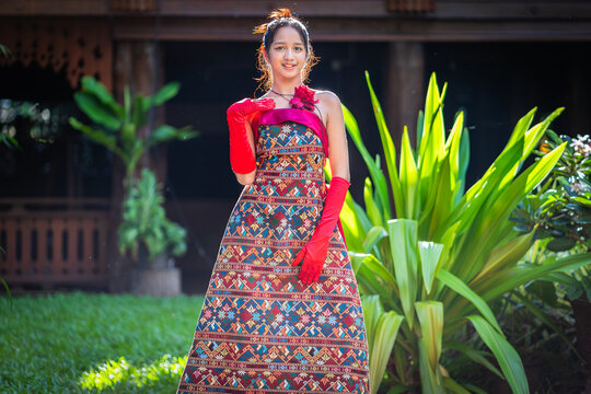 Modern Fashion Protrait Beautiful Asian Woman in Traditional Embroidery Patterns of Ethnic Minorities.