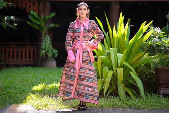 Modern Fashion Protrait Beautiful Asian Woman in Traditional Embroidery Patterns of Ethnic Minorities.