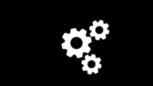 Gears rotating and assembling on black background showcasing mechanical process in three frames video motion movement machinery engineering technology industrial