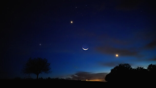 Crescent Moon, planet conjunction and landscape scenery silhouettes.