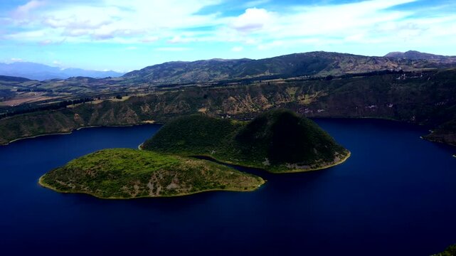 Aerial View of Andean Crater Lake in Ecuador with Blue Water, Volcanic Islands, Rugged Hills and Scenic Mountain Travel Landscape