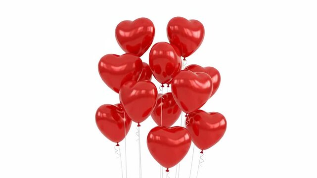 A beautiful cluster of vibrant red heart shaped balloons against white background