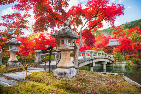 lantern by bridge of Eikan-do shrine with autumn garden colors, Kyoto