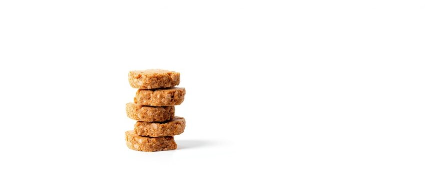 Stack of oat cookies on a white background
