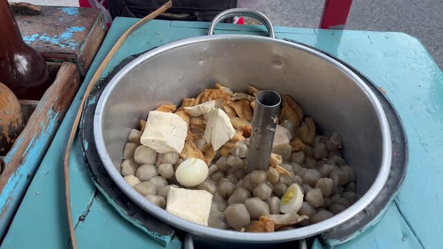 Indonesian Street Food Vendor Preparing Bakso Meatballs Close Up