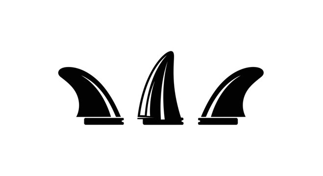 Three black surfboard fins are arranged side by side on a surface