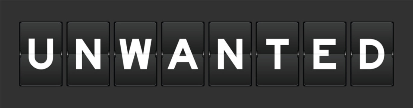Black color analog flip board with word unwanted on gray background