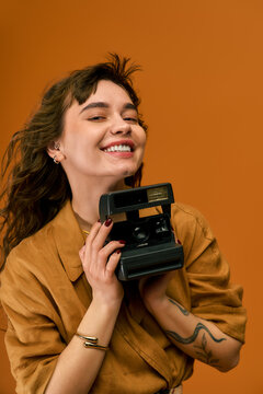 Bright summer vibes with a joyful young woman enjoying her fashionable moments