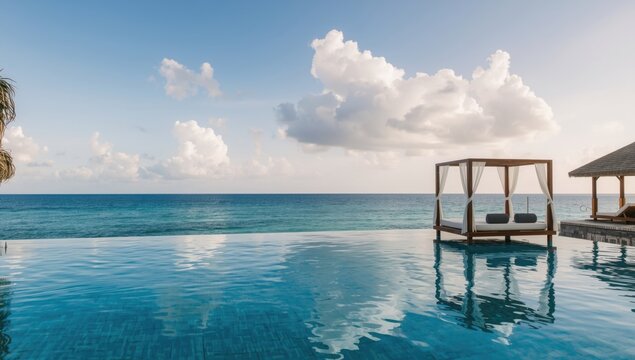 Tropical paradise resort pool with serene daybed by calm blue waters under soft sky