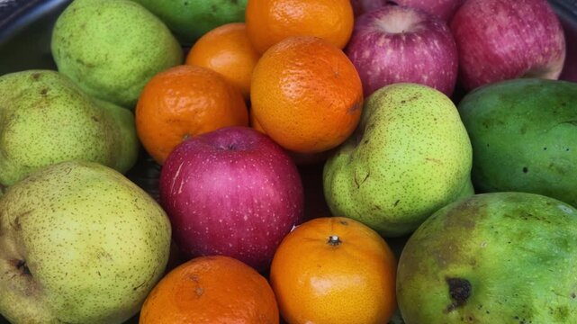 Fresh Assorted Fruits with Apples Pears Oranges and Mangoes