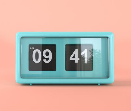 Blue retro vintage flip clock isolated on pink background