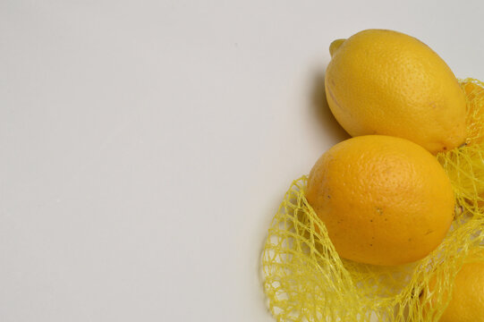 lemons on a white background close up with generous copy space, horizontal composition border layout