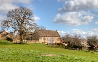 Hay barn on the Cotswold Way at Bourton-on-the-Hill, Gloucestershire, England. © Skipper Roland
