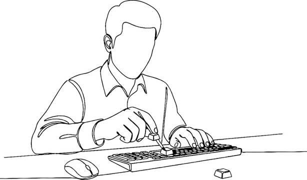 Person typing on a computer keyboard at desk.