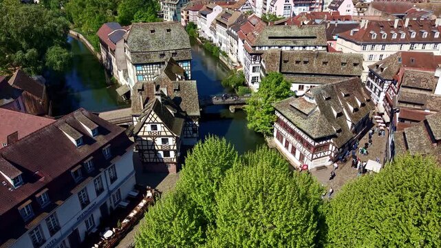Quai des Moulins and Pont du Faisan in historic Petite France district in Strasbourg, France. Aerial drone