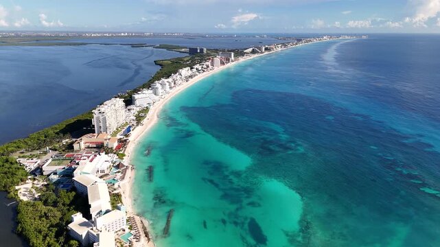Aerial View of Cancun Mexico Hotel Zone, Resorts Along Caribbean Sea and White Sandy Shoreline, Drone Shot