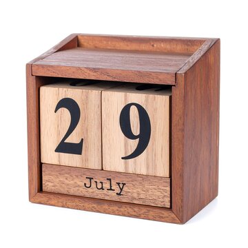 A wooden perpetual calendar displaying the date July 29