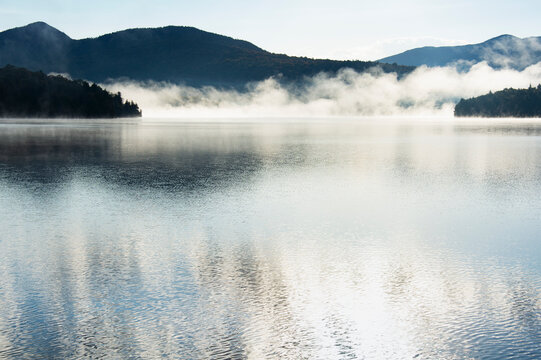 Autumn mist rising on Lake Placid