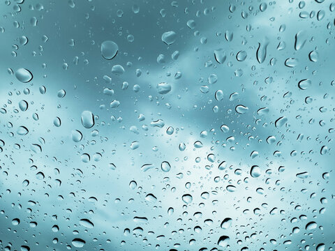 Close-up of rain drops on window glass
