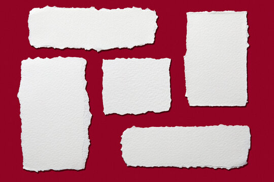 Torn paper on red background