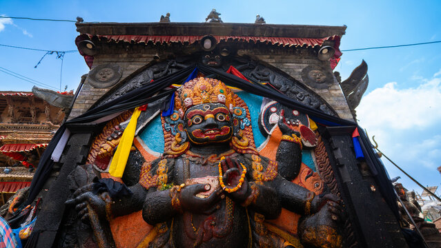 Ancient idol of Shree Kaal Bhairav, a fierce Hindu deity, at Kathmandu Durbar Square in Nepal