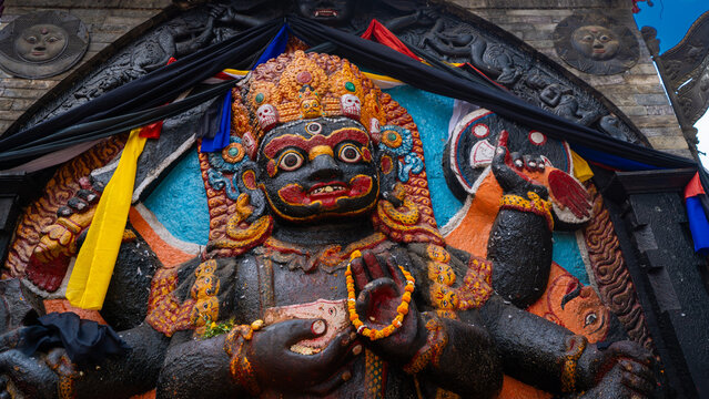 Ancient idol of Shree Kaal Bhairav, a fierce Hindu deity, at Kathmandu Durbar Square in Nepal