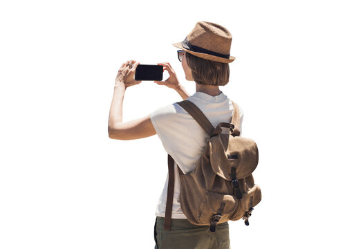 Young woman takes a photo or video on her mobile phone during vacation isolated transparent PNG, cheerful student girl traveling abroad in summer - isolated design element, travel and tourism concept