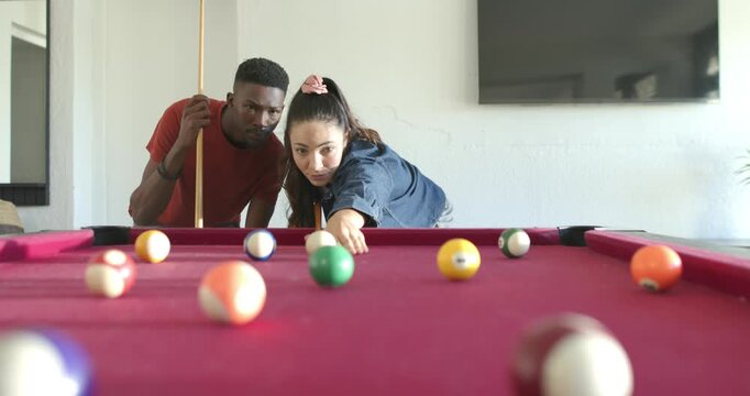 Diverse friends leaning redfelt home rack urging woman-denim lining hitting cue for-fun man-smiling