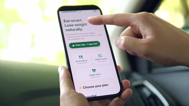 User viewing a 7-day trial offer on a weight loss app. Order App button highlighted for easy sign-up. Ideal for health marketing, subscription models, and customer acquisition stock footage.