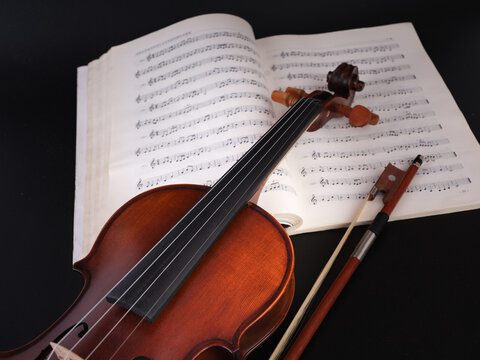 violin and music sheet