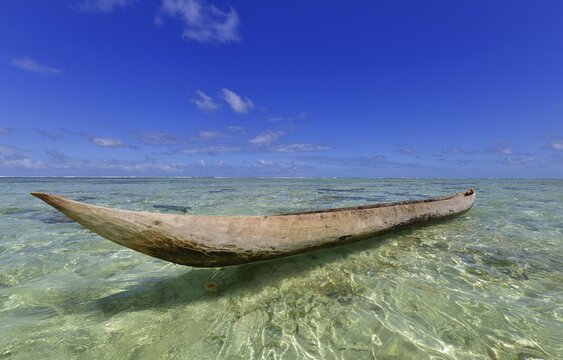 Traditional dugout boat on beach, Nosy Nato, eastern Madagascar, Madagascar