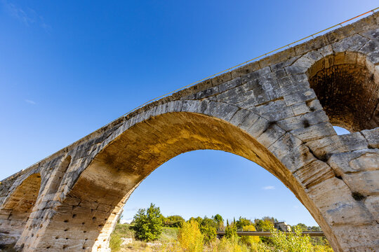 Low angle view of 3rd century Roman bridge, Pont Julien, on sunny day