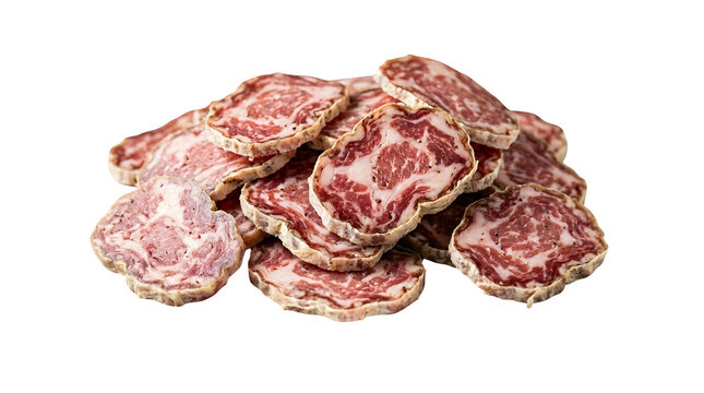 Slices of traditional Spanish salchichon dry cured sausage on white background
