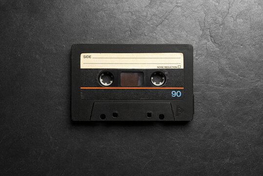 Audio cassette tape representing vintage music and retro tech.