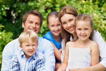 Fototapeta premium Portrait, parents and children with trip in nature for love, summer smile or bonding together. Happy, family and people with kids in park for connection, weekend break and holiday or vacation outdoor