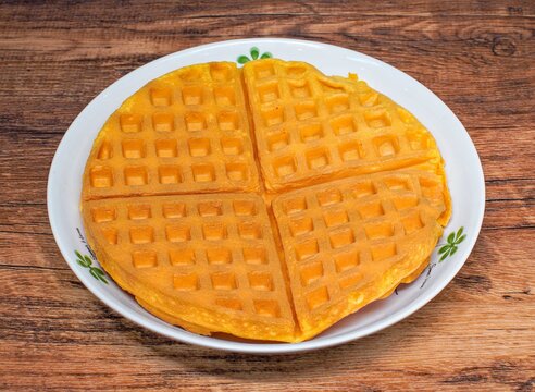 Fresh golden waffles with a soft inside and crispy texture perfect for breakfast