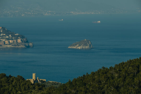 the Ligurian coast with the island of Bergeggi in the summer og august