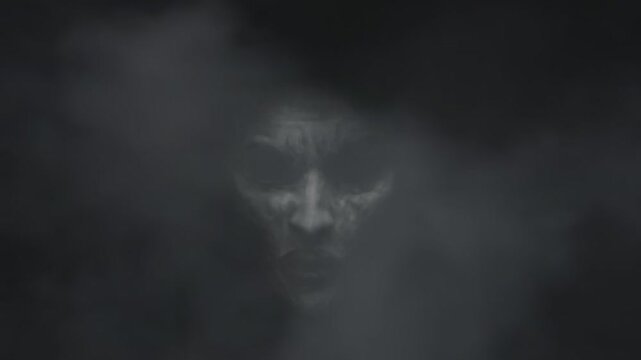 Scary ghost face appearing from thick dark smoke, creepy demon face in fog for halloween background