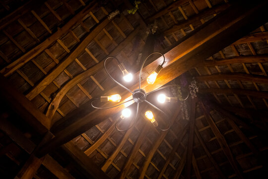 The ceiling of a joglo house, a traditional Javanese house, Indonesia, made of teak wood