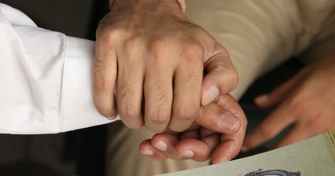 Doctor Holding Hands To Hope With His Patient