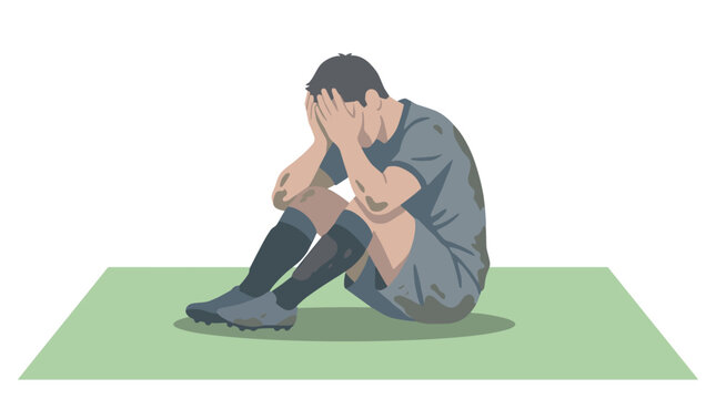Stressed soccer player sitting on the field covering his face with football depression emotional wellbeing struggle pressure exhaustion disappointment sportsman character