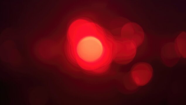 Out of focus red glow creating bokeh effect