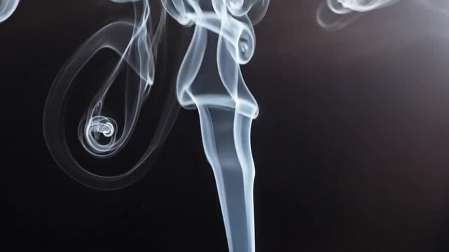 Smoke swirling in the darkness.