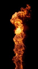 Fototapeta premium Vertical plume of vibrant, realistic orange and yellow flame against black